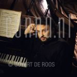 23-06-1994 Alexander Njevski at studio in Amsterdam.

[keywords]Posed, Headshot, Piano[/keywords]